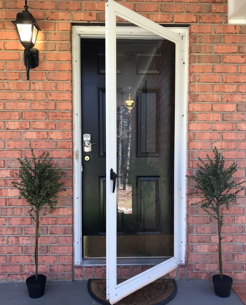 myrtle tree flanking front door for spring front porch decor