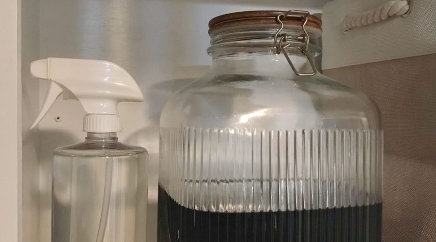 laundry room shelving with detergent in glass jar