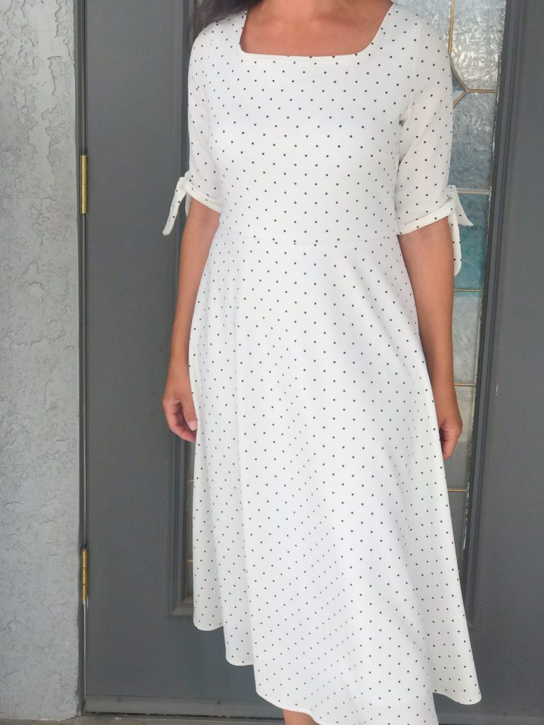 woman modeling a classy dress